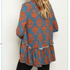 Peplum cowl neck sweater
